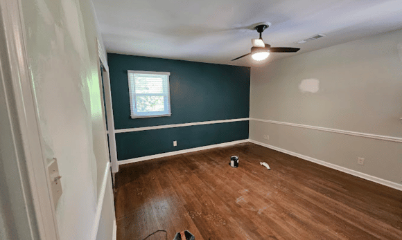 A project by Handyman Atlanta painting an indoor residential room.